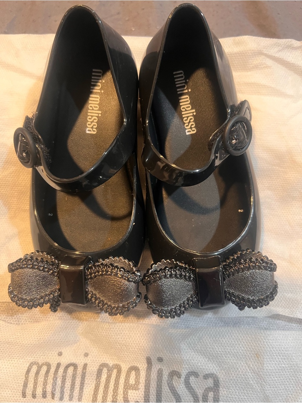 Mini Melissa Girls Black Glossy Mary Jane Shoes with Decorative Bow